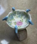Scalloped bowl with sculpted blue birds
